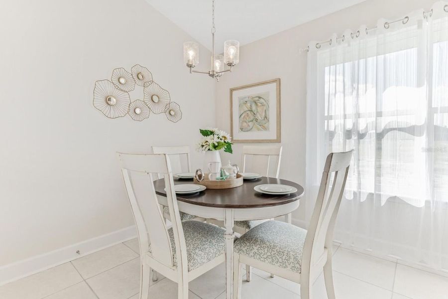 Representative furnished interior of a home built from the 1820 by Adams Homes in Winding Oaks, Weeki Wachee (Image 13).