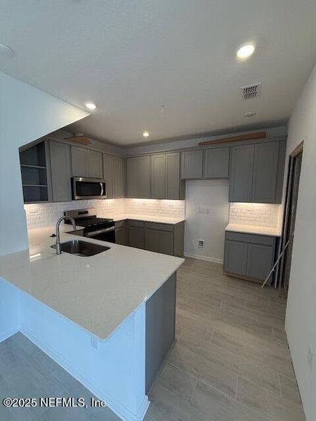 Furnished interior view inside a new home in Brook Forest - Townhomes, St. Augustine (Image 4). Furnished interior view inside a new home in Brook Forest - Townhomes, St. Augustine (Image 4).