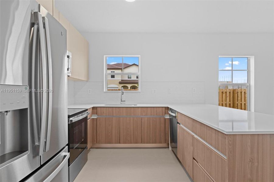 Furnished interior view inside a new home in , Homestead (Image 6). Furnished interior view inside a new home in , Homestead (Image 6).