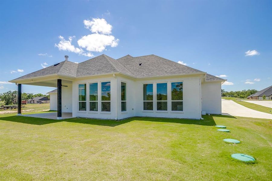 Exterior details and patio area of a home in , Springtown (Image 30). Exterior details and patio area of a home in , Springtown (Image 30).