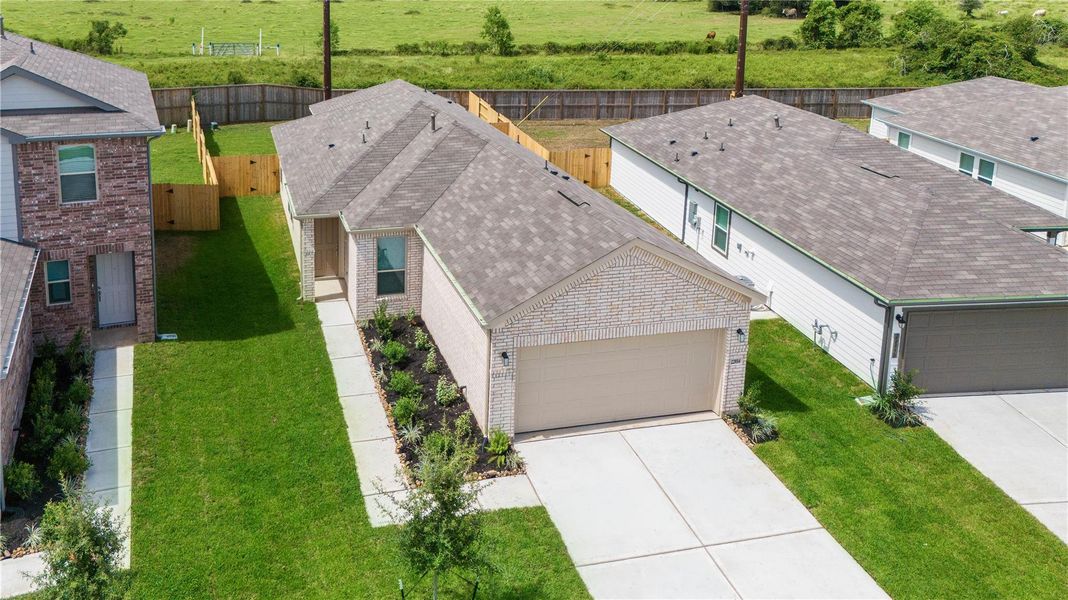 Aerial perspective of 22854 Fulton Landing and green space behind the property. Aerial perspective of 22854 Fulton Landing and green space behind the property.