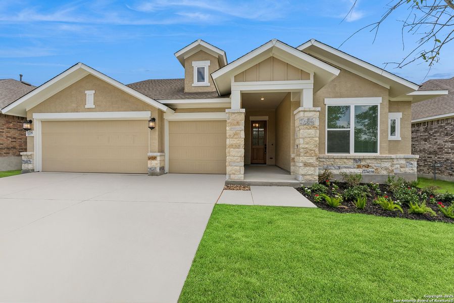Front exterior of a new home in Davis Ranch 60', San Antonio, TX, highlighting curb appeal (Image 2). Front exterior of a new home in Davis Ranch 60', San Antonio, TX, highlighting curb appeal (Image 2).