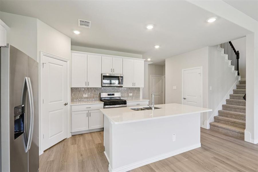 Furnished interior view inside a new home in Parks at Foster Crossing - Premier Series, Anna (Image 6). Furnished interior view inside a new home in Parks at Foster Crossing - Premier Series, Anna (Image 6).