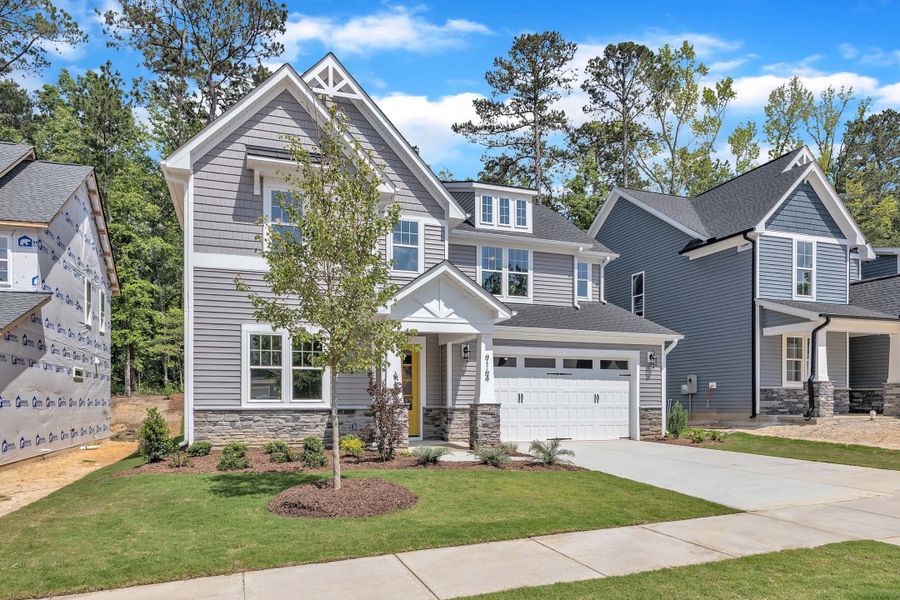 Representative exterior photo of a completed home built from the The Hampton by RobuckHomes in Kennebec Crossing, Angier, NC (Image 43). Representative exterior photo of a completed home built from the The Hampton by RobuckHomes in Kennebec Crossing, Angier, NC (Image 43).