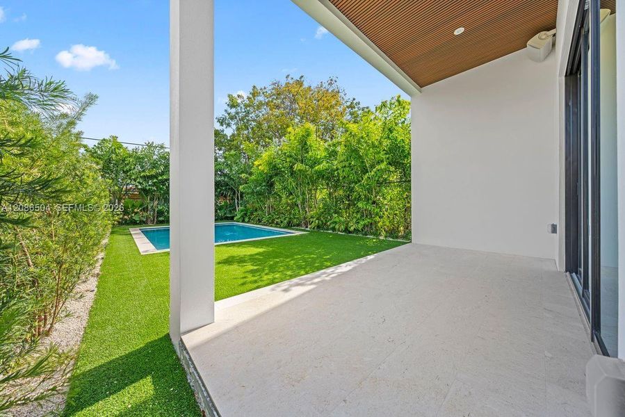 Exterior details and patio area of a home in , Miami (Image 3).