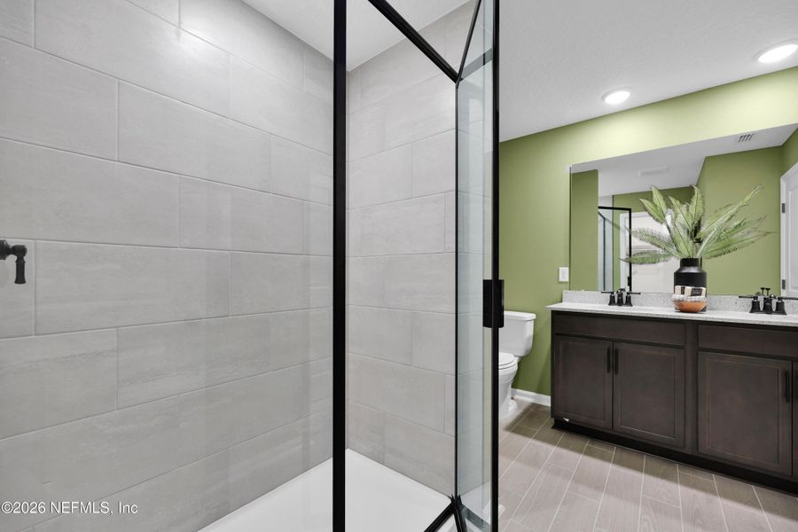 Furnished interior view inside a new home in Baxley Villas, Middleburg (Image 14).