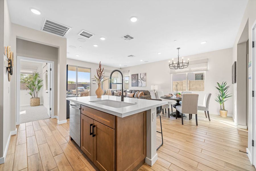 Kitchen, Dining Room & Great Room | Brisa | Mira Vista at Victory in Buckeye, AZ by Landsea Homes