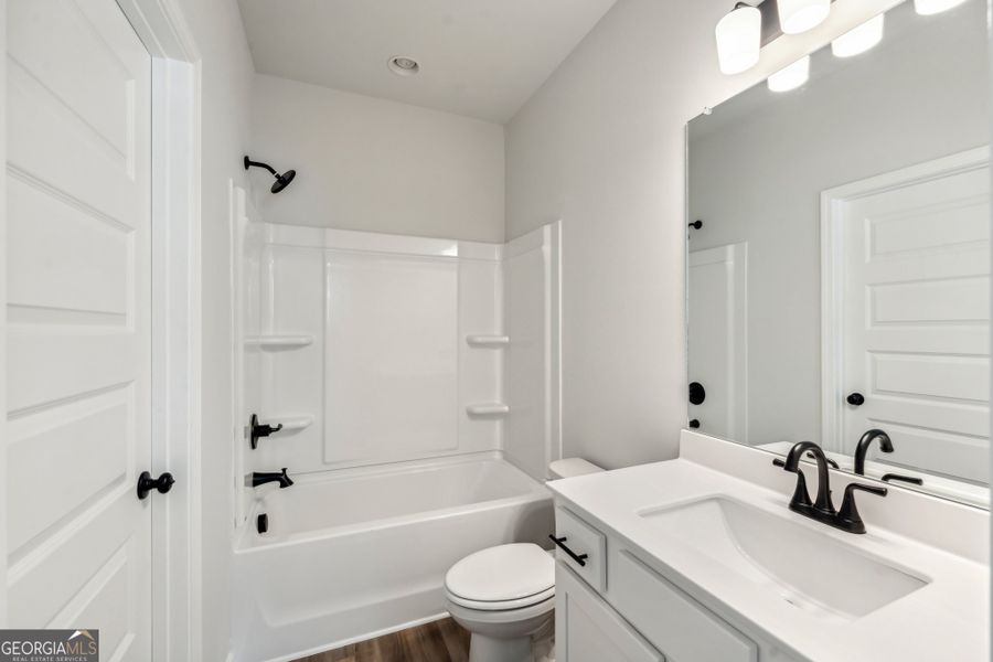 Furnished interior view inside a new home in Ponderosa Farms Manor, Gainesville (Image 17). Furnished interior view inside a new home in Ponderosa Farms Manor, Gainesville (Image 17).