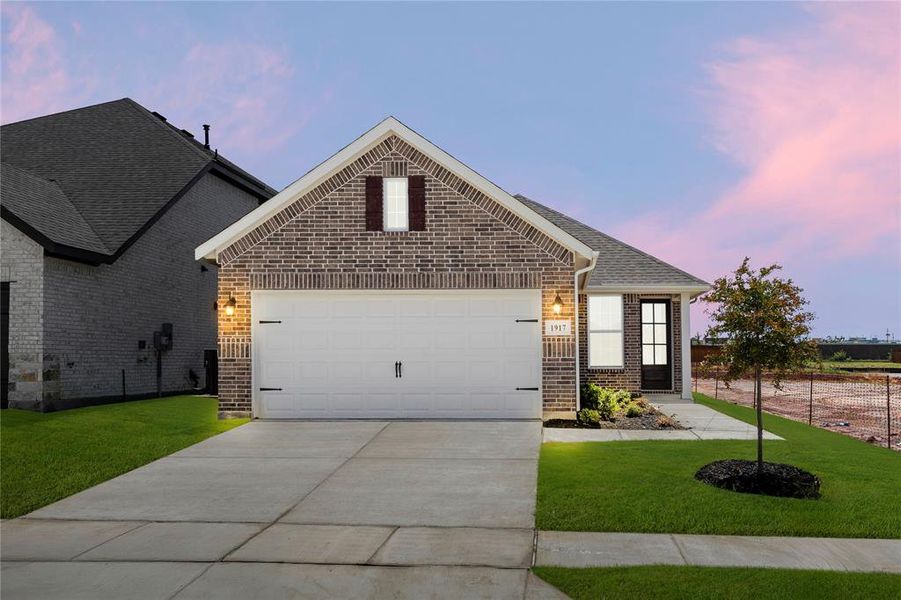 Front exterior of a new home in Walden Pond, Forney, TX, highlighting curb appeal (Image 1).
