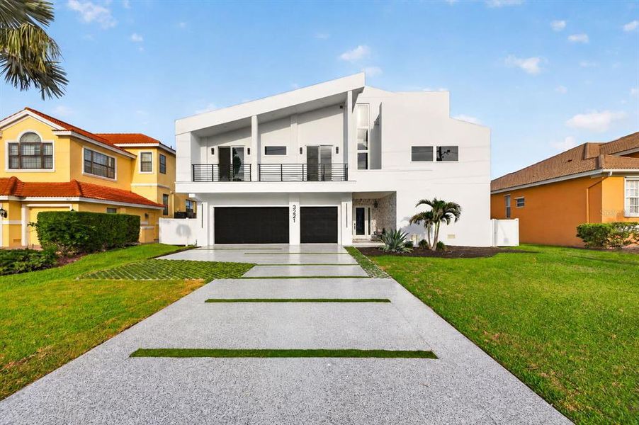 Front exterior of a new home in , Belleair Beach, FL, highlighting curb appeal (Image 32).