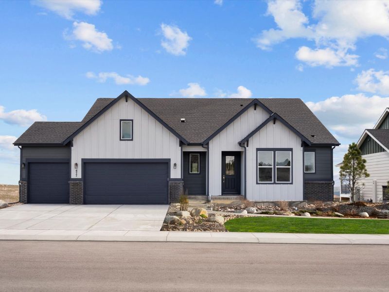 Front exterior of a new home in Jackson Creek, Monument, CO, highlighting curb appeal (Image 29).