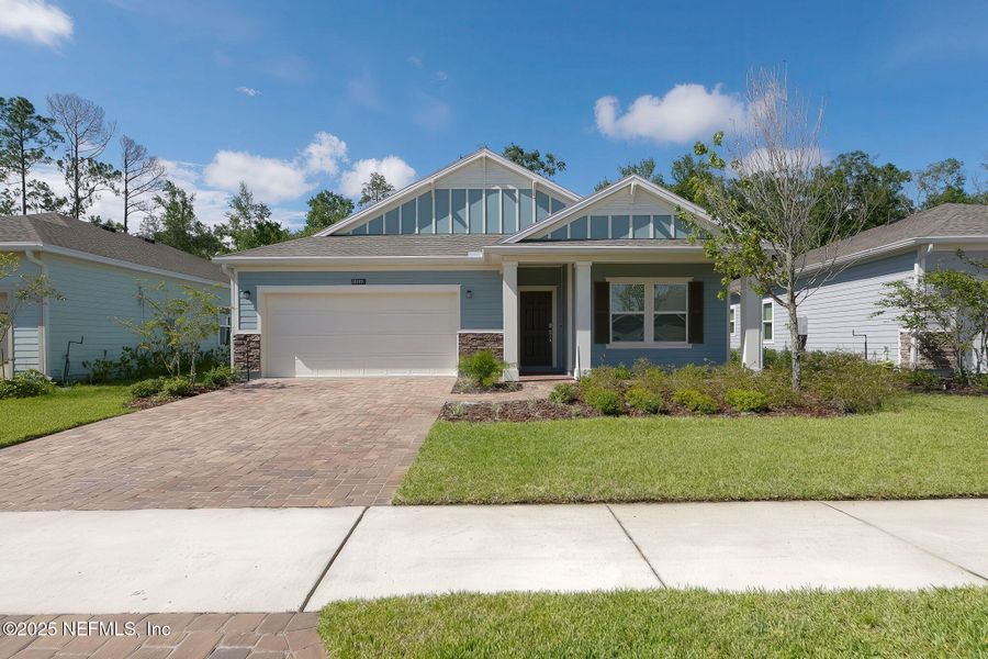 Front exterior of a new home in , St. Augustine, FL, highlighting curb appeal (Image 2).