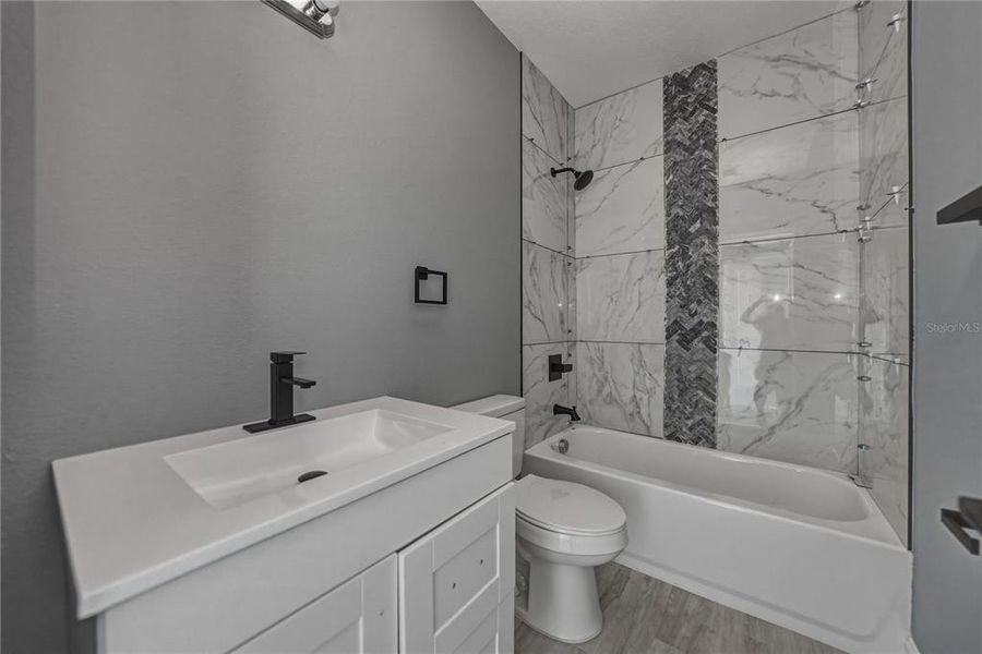 Furnished interior view inside a new home in , Indian Lake Estates (Image 8).