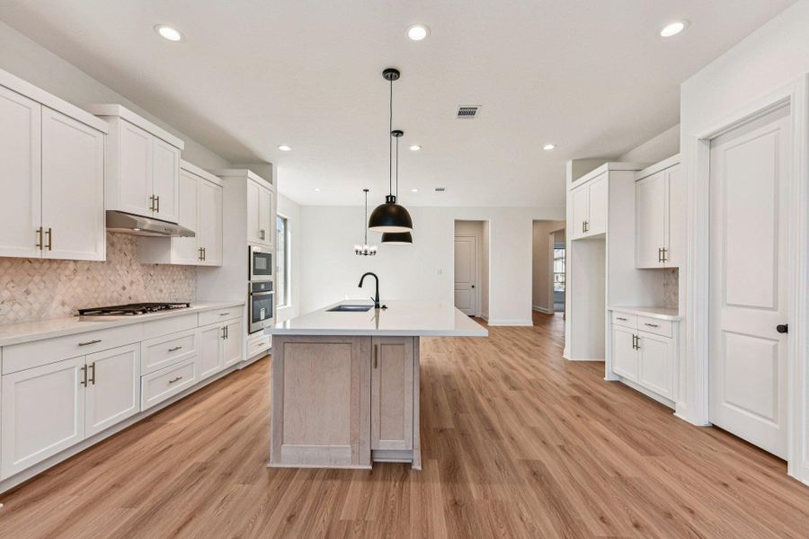 Furnished interior view inside a new home in 6 Creeks, Kyle (Image 8).