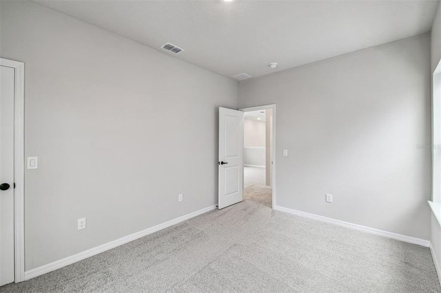 Spacious, unfurnished interior of a new home in Weslyn Park in Sunbridge 34', St. Cloud (Image 34).