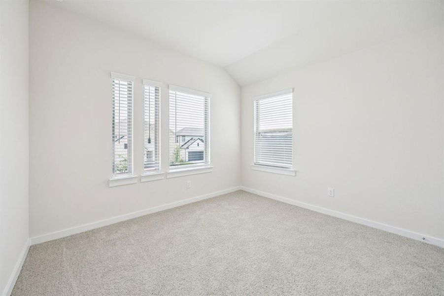 Bedroom in the Claret home plan by Trophy Signature Homes – REPRESENTATIVE PHOTO