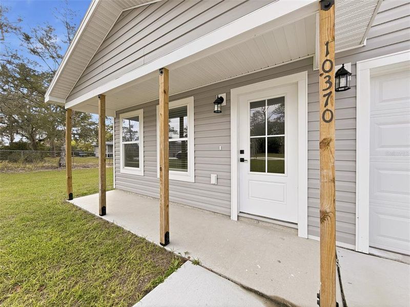 Exterior details and patio area of a home in , Weeki Wachee (Image 34).
