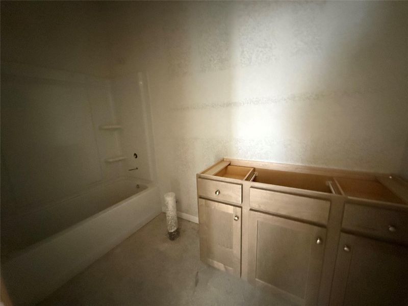 In-progress construction of a new home in The Cottages at La Cima, San Marcos, TX (Image 28).