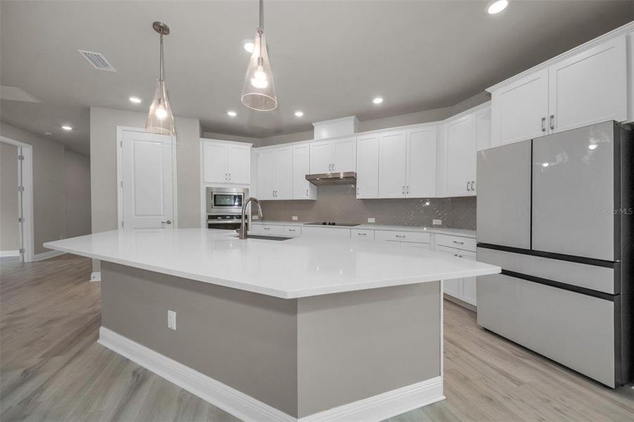 Furnished interior view inside a new home in Eagle Creek - Garden Series, Tarpon Springs (Image 10).