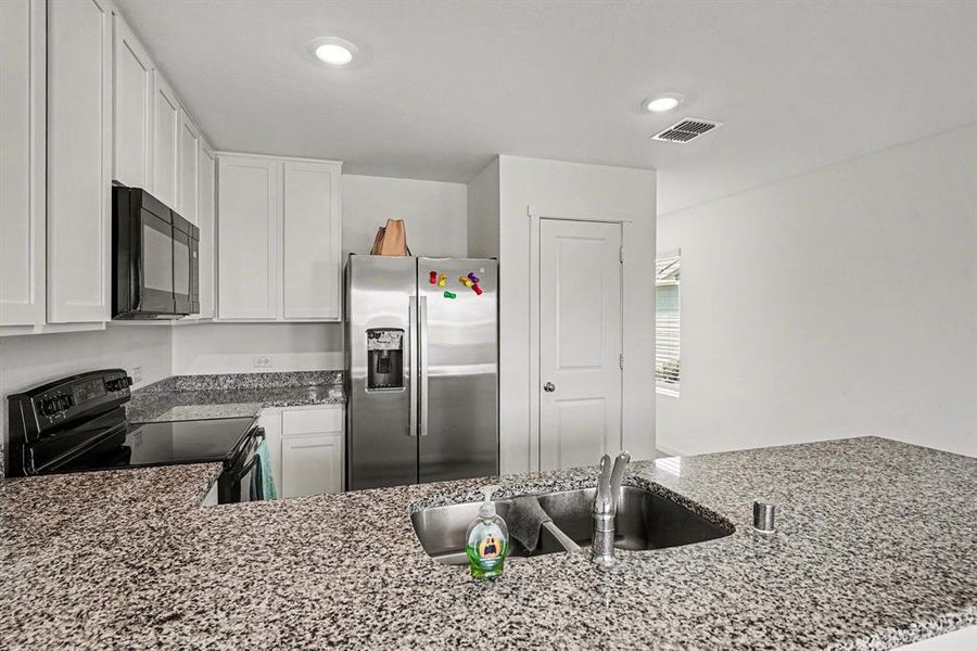 Furnished interior view inside a new home in Tillage Farms, Princeton (Image 13).