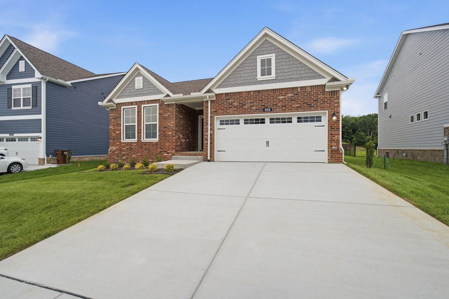 Front exterior of a new home in The Retreat at Norman Farm, Hendersonville, TN, highlighting curb appeal (Image 2). Front exterior of a new home in The Retreat at Norman Farm, Hendersonville, TN, highlighting curb appeal (Image 2).