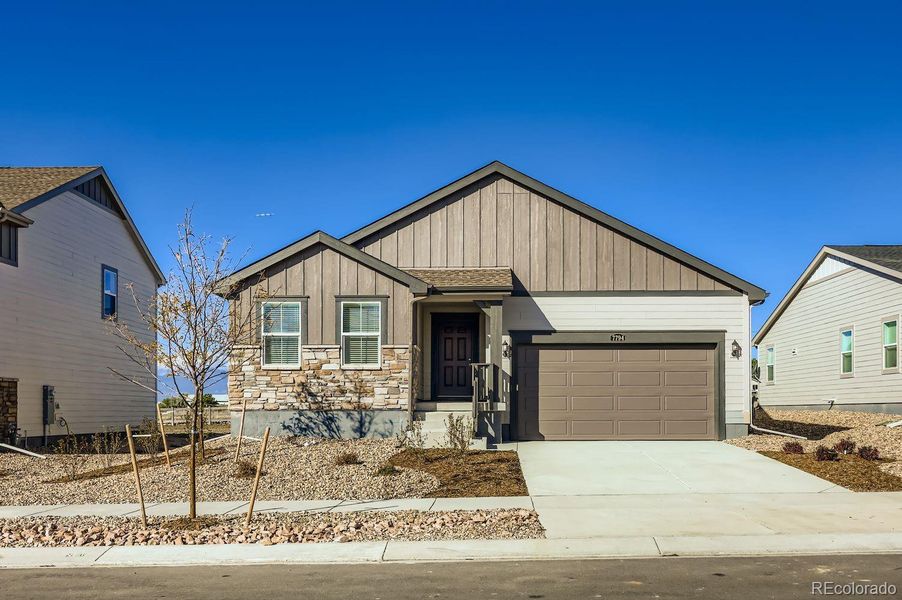 Front exterior of a new home in Percheron: The Camden Collection, Colorado Springs, CO, highlighting curb appeal (Image 2).