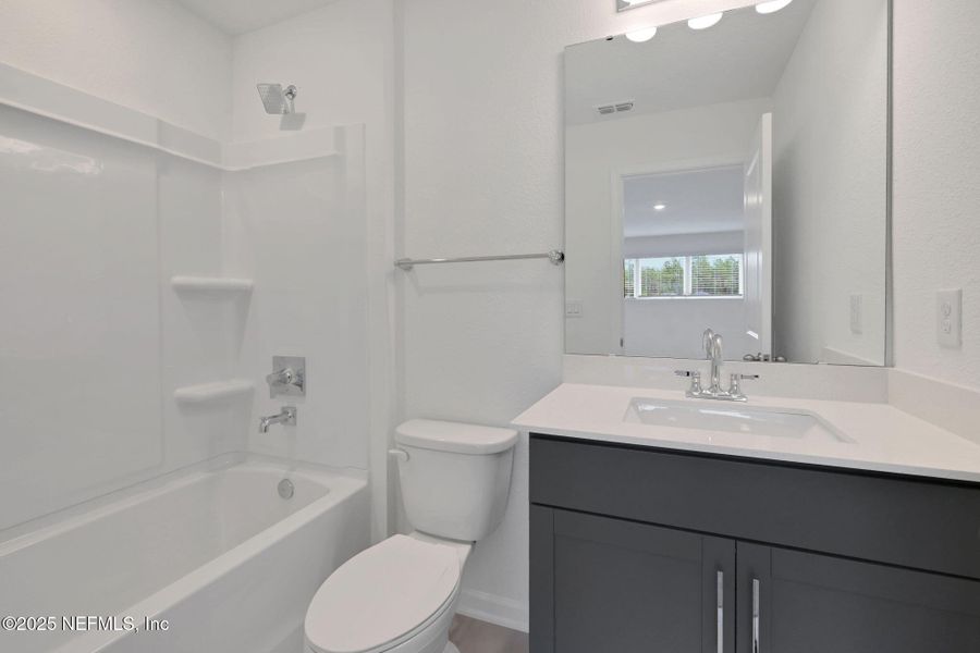 Furnished interior view inside a new home in Brook Forest - Single Family Homes, St. Augustine (Image 8). Furnished interior view inside a new home in Brook Forest - Single Family Homes, St. Augustine (Image 8).