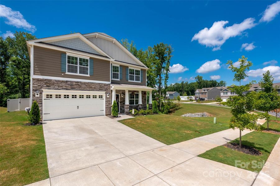 Front exterior of a new home in Azalea Ridge, Mount Holly, NC, highlighting curb appeal (Image 22).