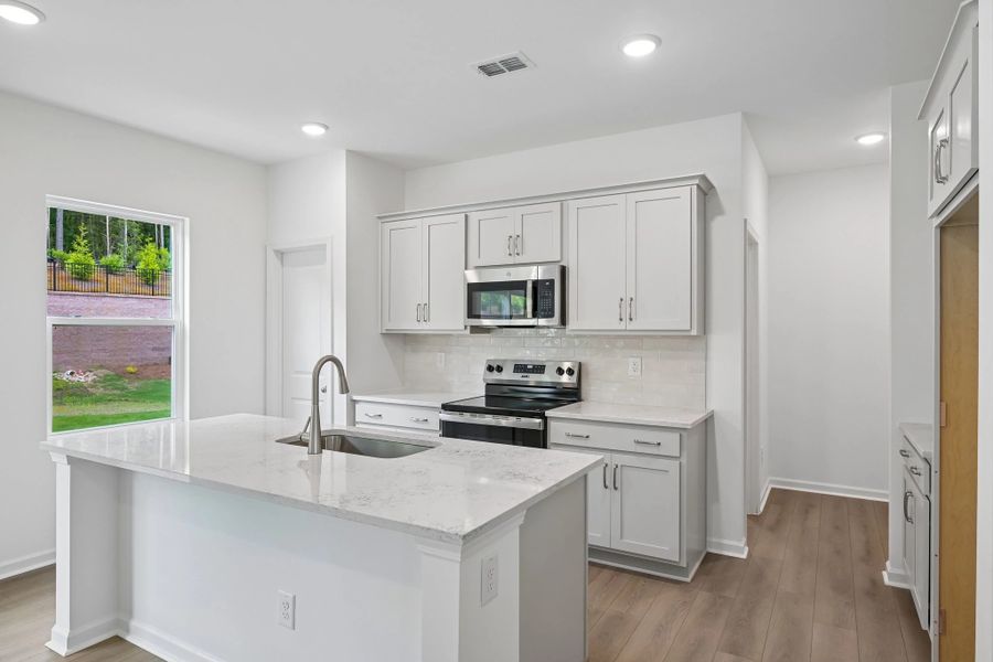 Furnished interior view inside a new home in Middleton Farms, Middlesex (Image 10).