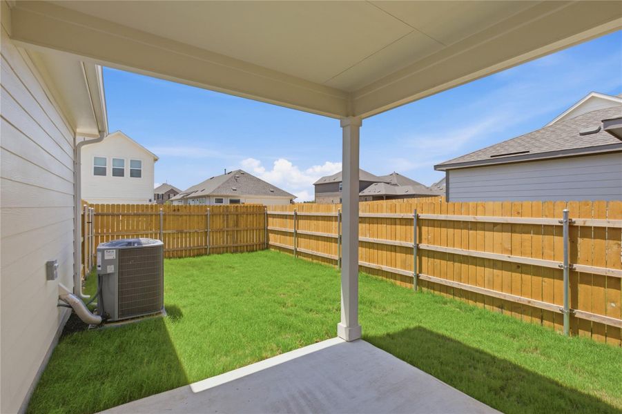Exterior details and patio area of a home in Creeks Crossing, Elgin (Image 19). Exterior details and patio area of a home in Creeks Crossing, Elgin (Image 19).