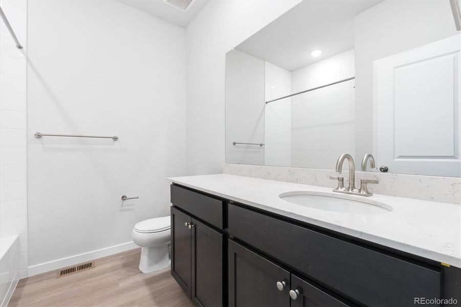 Furnished interior view inside a new home in Sweetgrass, Dacono (Image 8).