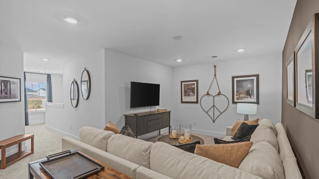 Refined loft with comfortable carpeted flooring and tasteful design throughout at Barton Hollow