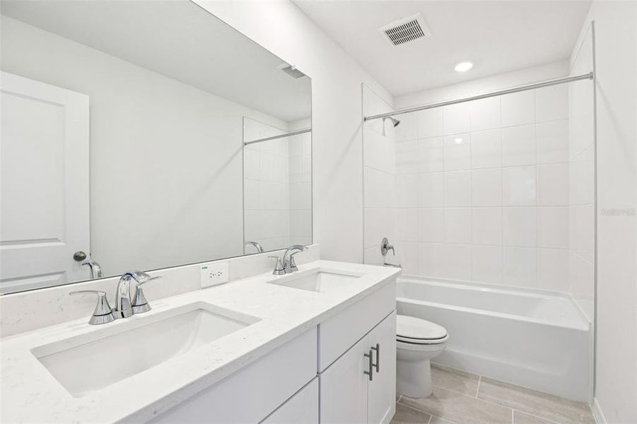 Furnished interior view inside a new home in Benton Hills - Classic Series, Brooksville (Image 13). Furnished interior view inside a new home in Benton Hills - Classic Series, Brooksville (Image 13).