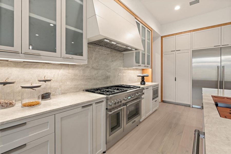 Elegant luxury kitchen with high-end appliances. Elegant luxury kitchen with high-end appliances.