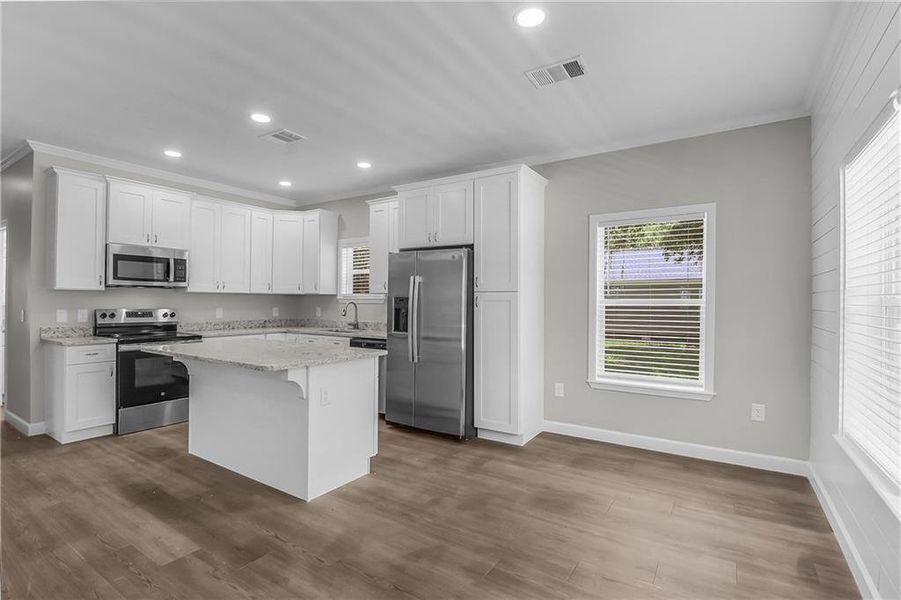 Furnished interior view inside a new home in , Ludowici (Image 8).