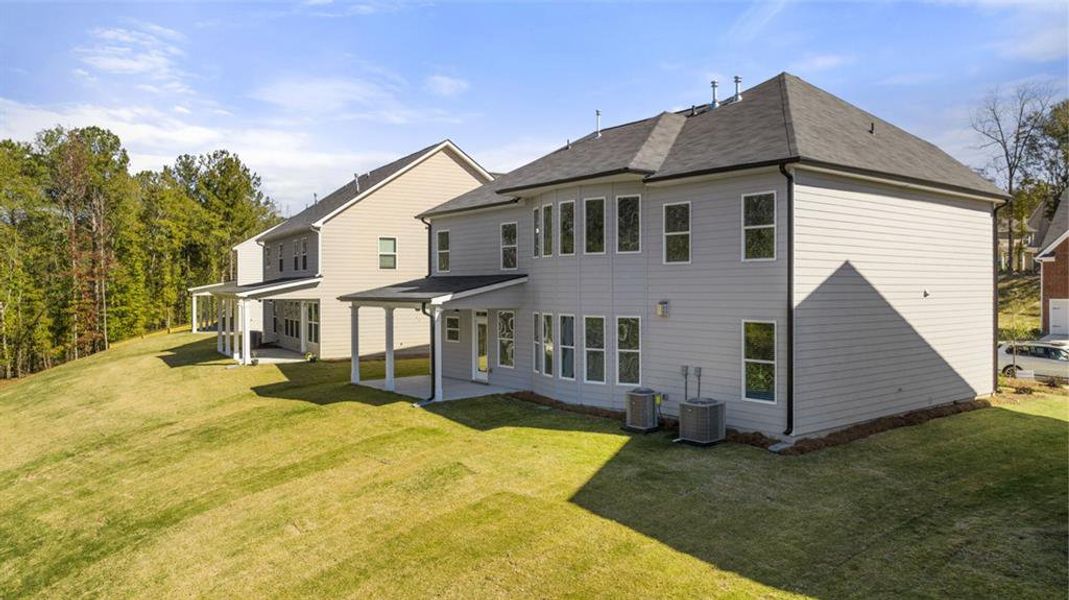 Exterior details and patio area of a home in The Gates at Pates Creek, Hampton (Image 3).