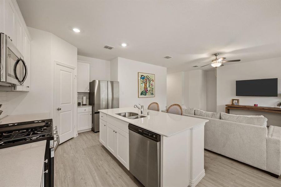 Furnished interior view inside a new home in Hurricane Creek: Classic 60s, Anna (Image 14). Furnished interior view inside a new home in Hurricane Creek: Classic 60s, Anna (Image 14).