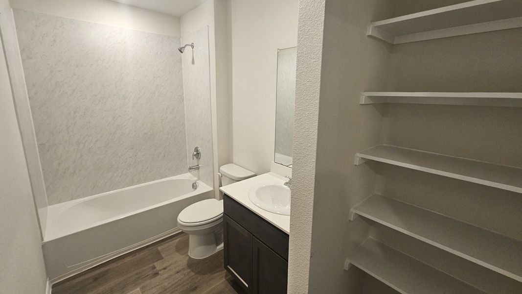 Representative furnished interior of a home built from the NICOLE by D.R. Horton in Northspur, Forney (Image 8). Representative furnished interior of a home built from the NICOLE by D.R. Horton in Northspur, Forney (Image 8).