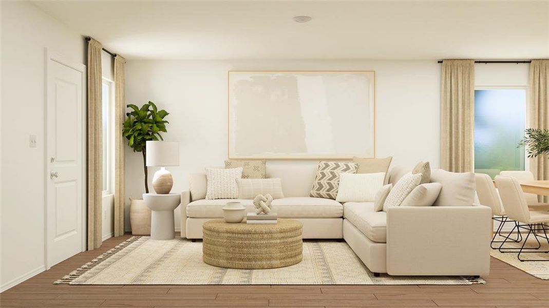 Living room with light hardwood / wood-style floors