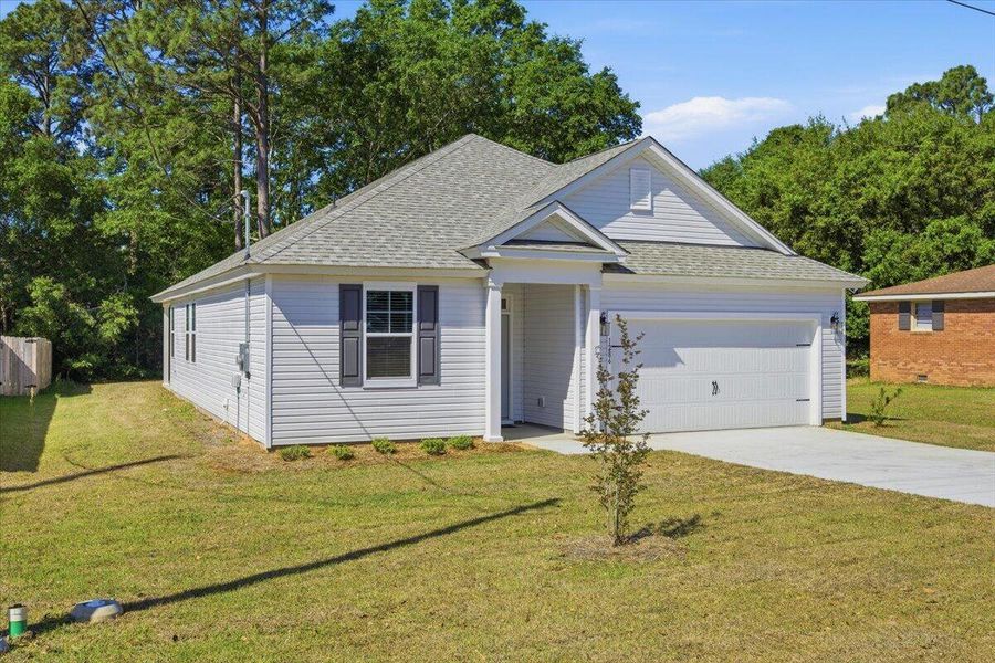 Front exterior of a new home in , Orangeburg, SC, highlighting curb appeal (Image 28).