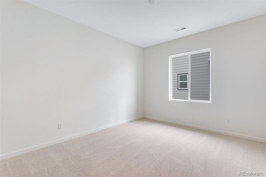 Spacious, unfurnished interior of a new home in Reunion, Commerce City (Image 18).