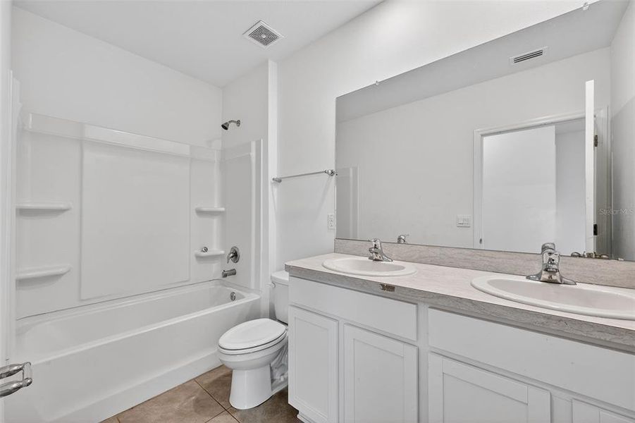 Furnished interior view inside a new home in Farm at Varrea, Plant City (Image 11).