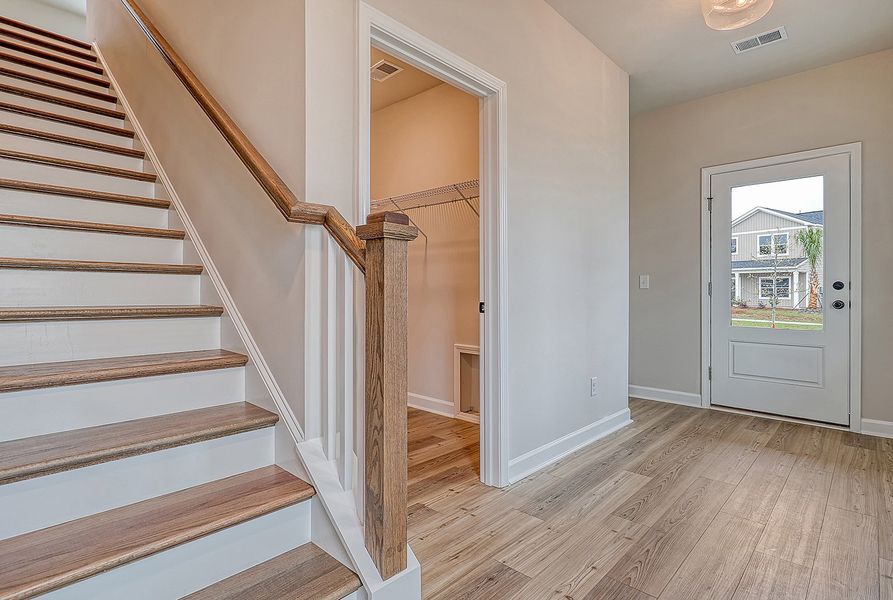 Representative unfurnished interior of a home built from the Washington by Ashton Woods in Watson Hill, Summerville (Image 8).
