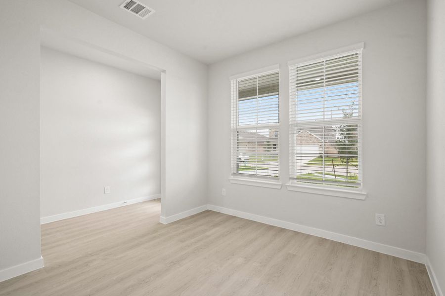 Spacious, unfurnished interior of a new home in Sunterra, Katy (Image 21).