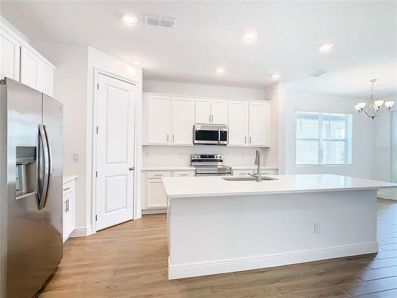 Furnished interior view inside a new home in , Winter Garden (Image 10).
