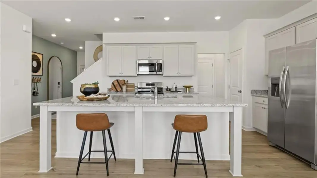 Furnished interior view inside a new home in Towns at Ivy Creek, Buford (Image 3).