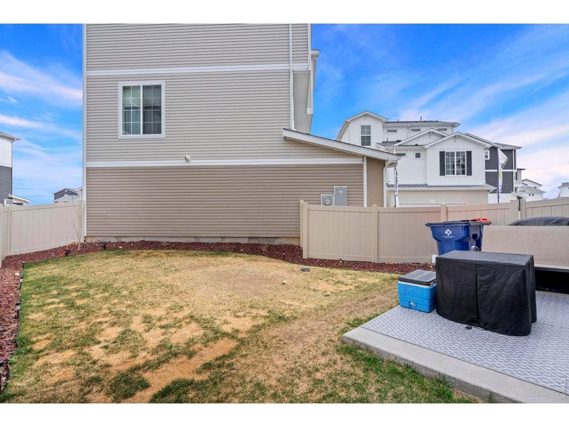 Exterior details and patio area of a home in Thompson River Ranch, Johnstown (Image 3).