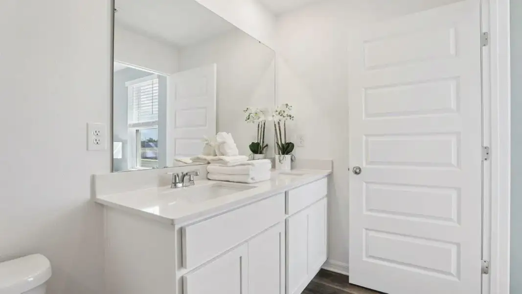 Furnished interior view inside a new home in Atria at Ridgewood Lakes, Davenport (Image 18).