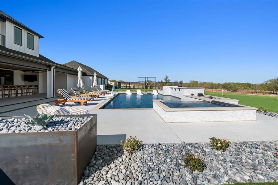 Outdoor pool with a patio Outdoor pool with a patio