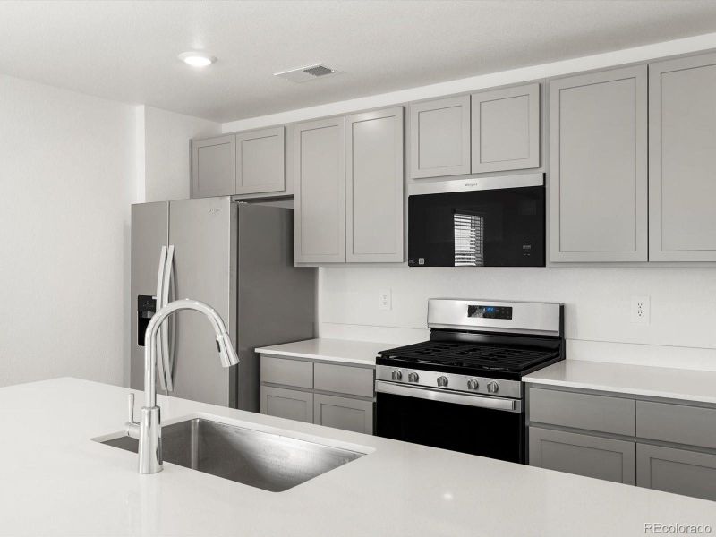 Furnished interior view inside a new home in Skyview at High Point, Aurora (Image 15).